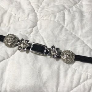 black felt bracelet, silver tone charms